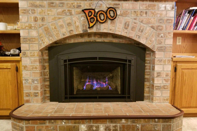Natural Gas Fireplace with Brick Surround